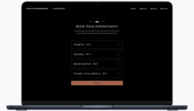 Black Chair Barbershop booking page on a laptop